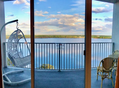 Soak in the beautiful view from this swing on the balcony