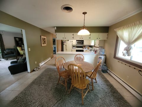 Breakfast area with living room. 