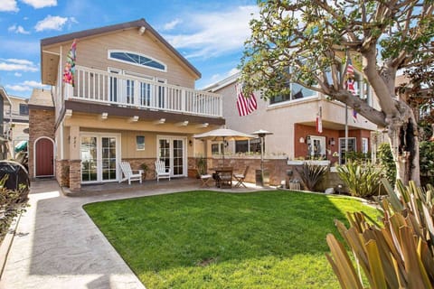 This house features a gated front yard with lots of extra space -- a rarity for vacation rentals.  This is a safe place to let the kids hang out in a