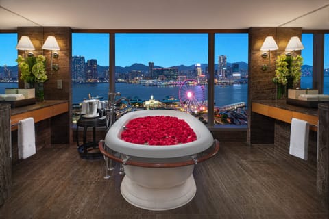 Suite, 1 King Bed, Harbor View | Bathroom | Separate tub and shower, designer toiletries, hair dryer, bathrobes
