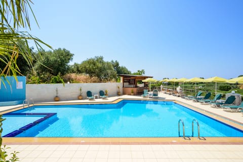 Outdoor pool, open 10:00 AM to 7:00 PM, pool umbrellas, sun loungers