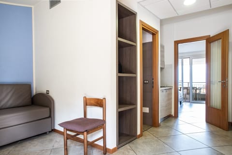 Junior Studio Suite, Lake View | In-room safe, desk, free WiFi, bed sheets