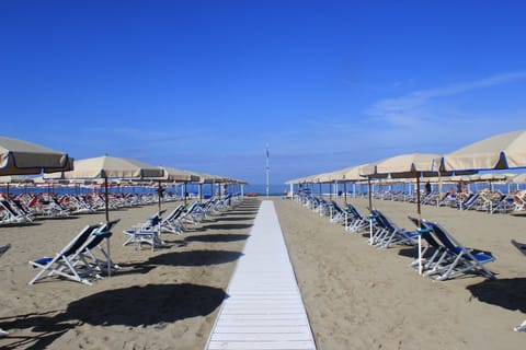 Private beach nearby, white sand, sun loungers, beach umbrellas