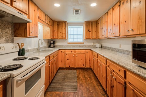 Galley kitchen, plenty of counter space & cabinets