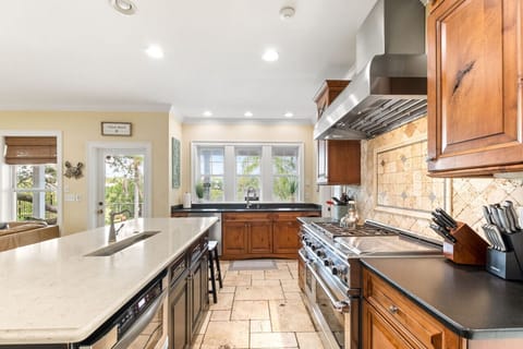 Double oven and overhead hood for all your cooking needs