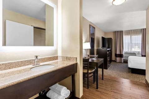 Premium bedding, laptop workspace, blackout drapes, iron/ironing board