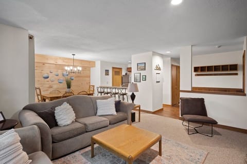 Open concept living room, dining room, kitchen, and mudroom.