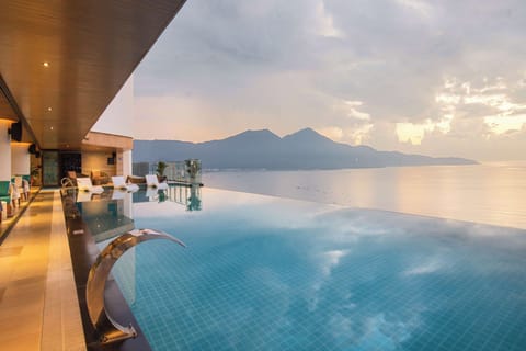 Outdoor pool, open 6:00 AM to 9:00 PM, sun loungers