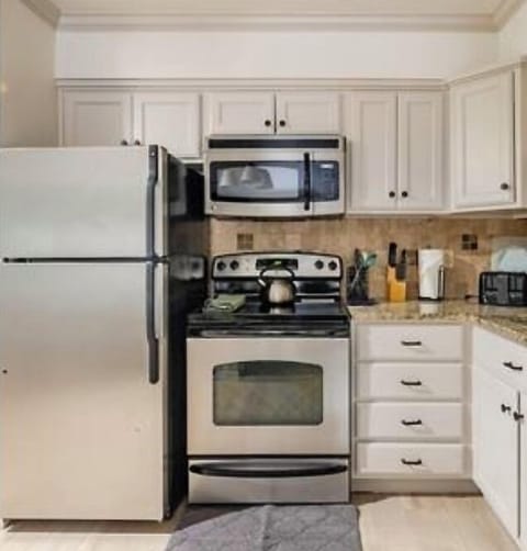 Fully equipped kitchen for meals in. Coffee pods provided.