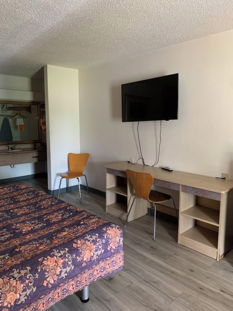 Basic Double Room | Blackout drapes, iron/ironing board, free WiFi, bed sheets