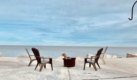 Large patio, firepit, sunrise and sunset views