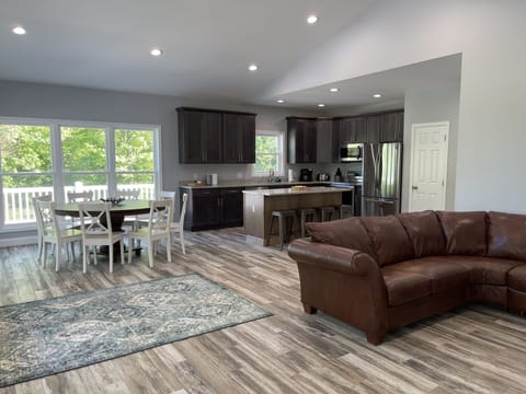 Designer great room, kitchen and dining area built in 2021