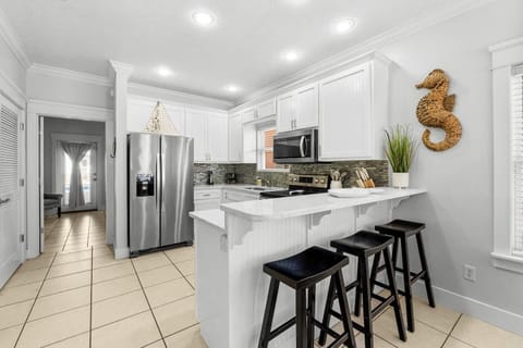 3 stools to use at the kitchen bar for more seating.