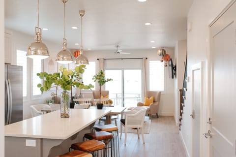 Bright kitchen with stainless appliances and a large island — ideal for cooking and gathering.