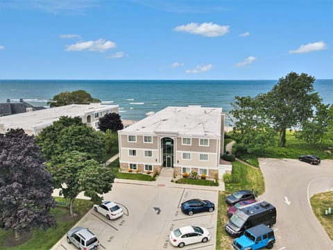 Aerial of building and lake