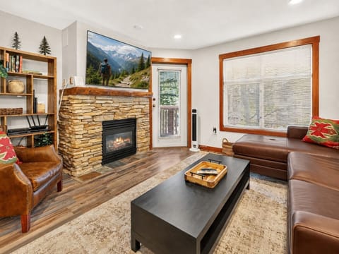 Living Room with TV, Gas Fireplace, sectional Couch, Reading Cha