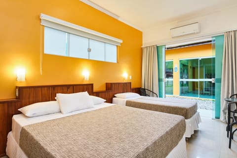 Deluxe Suite, Multiple Beds | Minibar, desk, free WiFi, bed sheets