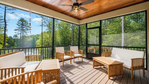 Beautiful screened-in porch overlooking the lake