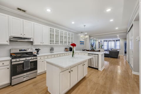 Check out the large kitchen! Stocked with utensils, dishware, and a KCup machine