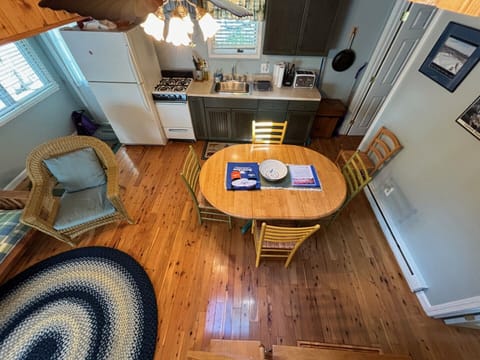 Looking down from the loft onto the kitchen space