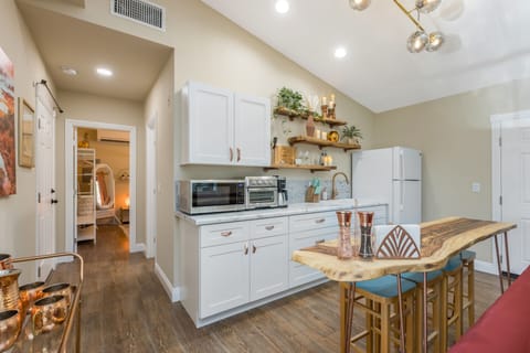 Kitchen appointed with Convection/Microwave Oven and double burner hot plate.