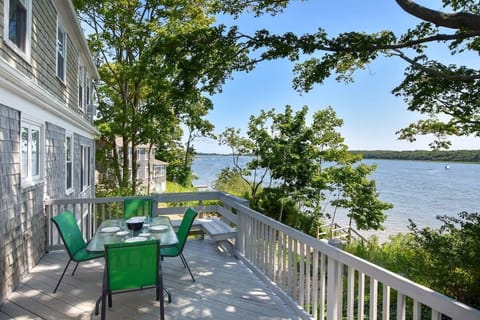 Deck with table for four overlooking the Orleans Cove