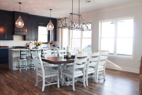 Dining room table and kitchen. Open floor plan
