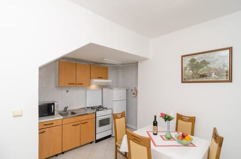 Apartment (Two Bedroom Apartment) | Private kitchen | Fridge