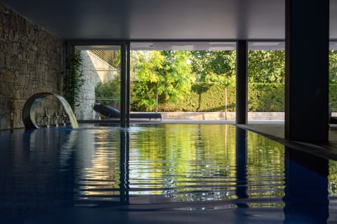 Indoor pool, seasonal outdoor pool, open 9:00 AM to 8 PM, pool umbrellas