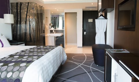 Premium bedding, down comforters, minibar, in-room safe