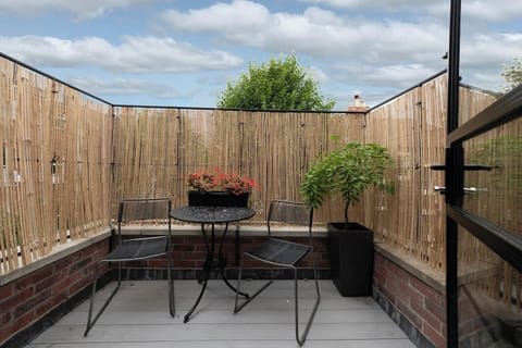 Private outdoor terrace is perfect for a morning cup of tea or a glass of wine before bed