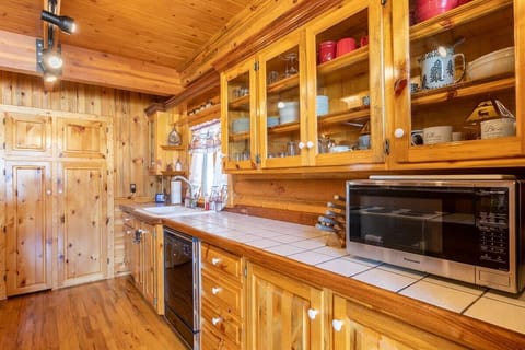 The kitchen is equipped with all the essentials to cook for yourself and or your guests