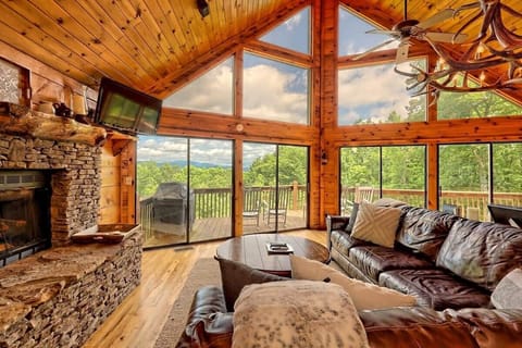 Grand living room overlooking the mountain views! Gas fireplaces will not be useable May 1 to October 31.