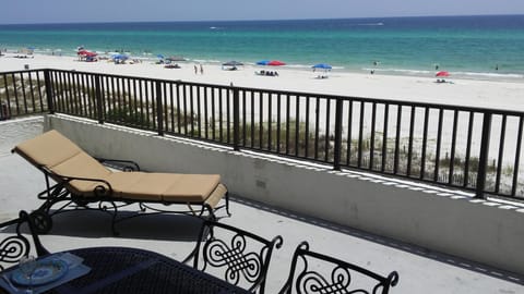 Extra large extended balcony with plenty of seating and great sunset views! 