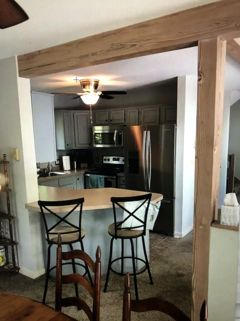 Kitchen bar facing into kitchen