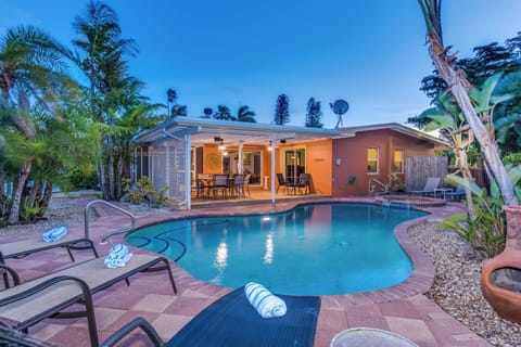 Heated Pool and hot tub.  Covered Patio