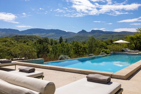 2 outdoor pools, pool umbrellas, sun loungers