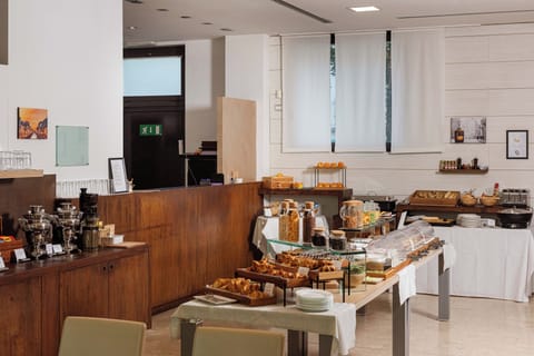 Daily buffet breakfast (EUR 12 per person)