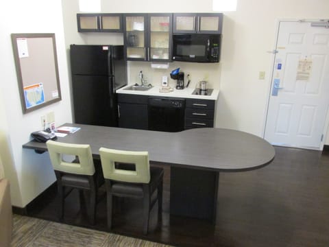 Suite, 1 Bedroom | Private kitchen | Full-size fridge, microwave, dishwasher, coffee/tea maker