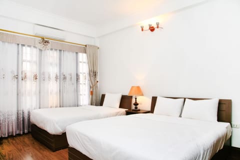 Family Room, Balcony | Desk, laptop workspace, blackout drapes, free WiFi