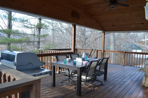 Covered porch with grill and seating