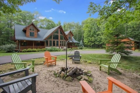 Comfortable Adirondack chairs around the fire pit