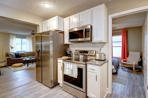 Kitchen coming out of the hall from the two back bedrooms.