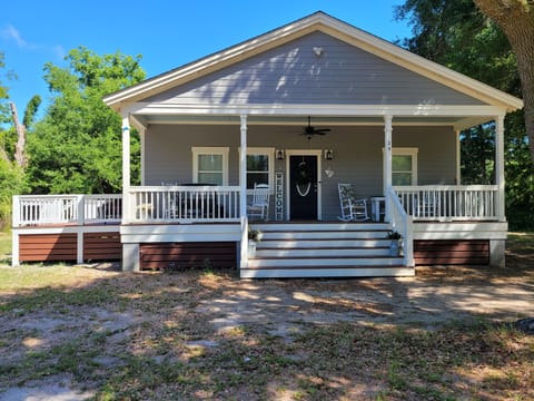 Beautiful large front porch w/lots of seating for the entire family 