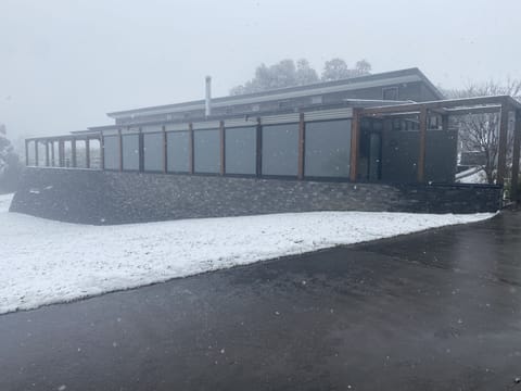 Exterior snow shot of the property 