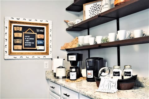 Coffee bar with a coffee maker, Keurig, ground coffee, k-cups and tea.
