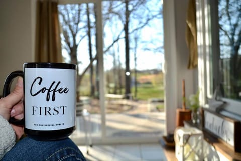 Beautiful view through the large sliding glass doors in the relaxing sunroom.