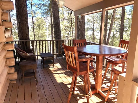 Dine Fresco-style under the covered deck, enjoy peek-a-boo views mountain/lake.