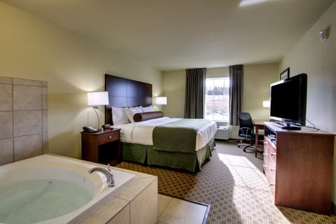 Suite, 1 King Bed, Non Smoking | Premium bedding, desk, laptop workspace, iron/ironing board