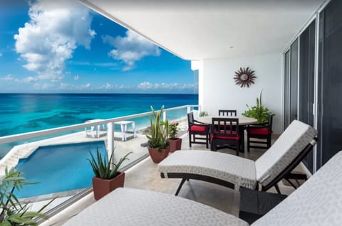 Deck overlooking the pool area and ocean